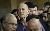 Former prime minister Ehud Olmert in Tel Aviv District Court, March 31, 2014, where he was found guilty of bribe-taking in the Holyland real estate scandal. (photo credit: Ido Erez/Pool/Flash90
