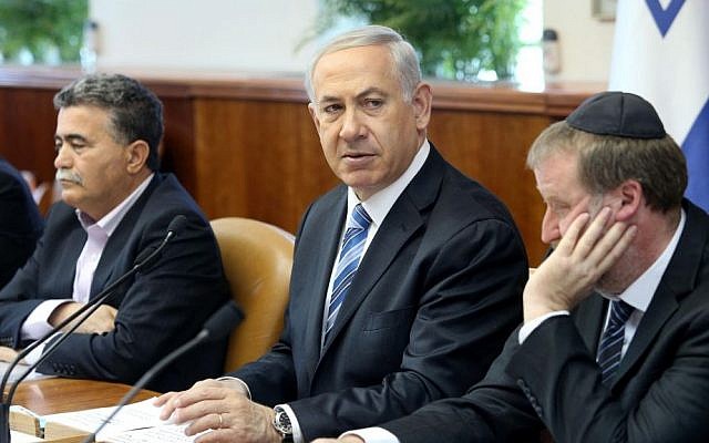 Prime Minister Benjamin Netanyahu, center, is seen at a cabinet meeting at the PMO in Jerusalem, April 6, 2014 (photo credit: Amit Shabi/Flash90/Pool) Prime Minister Benjamin Netanyahu, center, is seen at a cabinet meeting at the PMO in Jerusalem, April 6, 2014 (photo credit: Amit Shabi/Flash90/Pool)