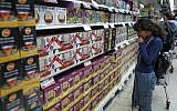 Illustrative photo of an Israeli woman in a Jerusalem grocery store on April 6, 2014 (photo credit: Hadas Parush/Flash 90)