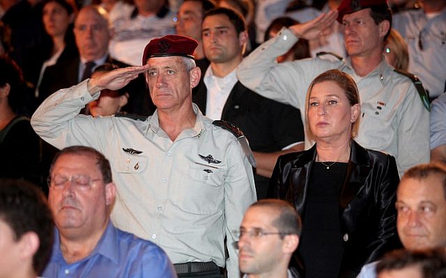 File: IDF Chief of Staff Benny Gantz, left, seen with Hatnua head Tzipi Livni, right, at a ceremony at Kibbutz Tel Yitzhak as Israel marked the Holocaust Remembrance Day on April 27, 2014. (Gideon Markowicz/Flash90) File: IDF Chief of Staff Benny Gantz, left, seen with Hatnua head Tzipi Livni, right, at a ceremony at Kibbutz Tel Yitzhak as Israel marked the Holocaust Remembrance Day on April 27, 2014. (Gideon Markowicz/Flash90)
