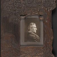Portrait of Horatio Gates Spafford (1828-1888), poet, philosopher, biblical scholar and lawyer, c. 1860-1888, set in a frame of engraved and glazed olive wood, with images of a sheltering tree, a river and the house on a wall — the first home of the American Colony in the Old City of Jerusalem (Library of Congress, 2005/Courtesy American Colony Archive Collections)