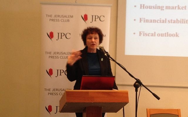 Bank of Israel chairperson Karnit Flug speaking at a press conference (Photo credit: Courtesy) Bank of Israel chairperson Karnit Flug speaking at a press conference (Photo credit: Courtesy)