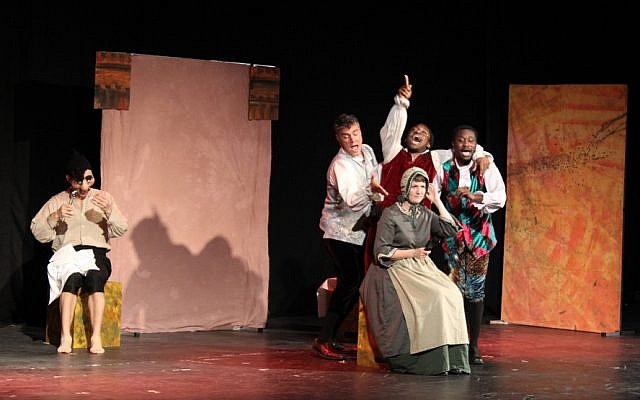 Five of the six actors performing in Romeo and Juliet — Damien Warren-Smith, Darius McStay, Natey Jones, Jude Owusu and Ruth Cataroche — act out a silly scene during TNT Britain's production of  Romeo and Juliet in Jerusalem (photo credit: Rebecca McKinsey/The Times of Israel)