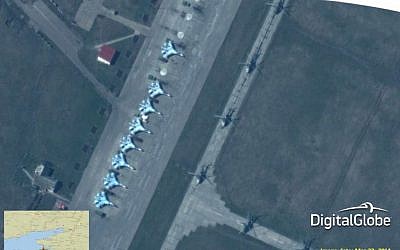 This satellite image made on March 22, 2014 shows what are purported to be Russian military Su-27/30 "Flankers" aircraft at the Primorko-Akhtarsk Air Base in southern Russia. (photo credit: AP/DigitalGlobe via SHAPE)