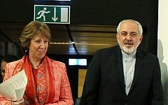 European foreign policy chief Catherine Ashton and Iranian Foreign Minister Mohamad Javad Zarif, after closed-door nuclear talks in Vienna, Austria, Wednesday, April 9, 2014 (photo credit: AP /Ronald ZaK)