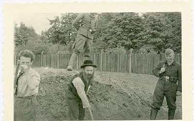 Jewish men rounded up for forced labor in Krakow, Poland (photo credit: Shem Olam Institute)