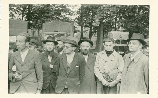 Jewish men rounded up for forced labor in Krakow, Poland (photo credit: Shem Olam Institute)