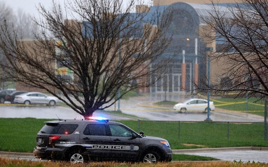 A police vehicle near the location of a shooting at the Jewish Community Center in Overland Park, Kansas, Sunday, April 13, 2014. (Jamie Squire/Getty Images via JTA) A police vehicle near the location of a shooting at the Jewish Community Center in Overland Park, Kansas, Sunday, April 13, 2014. (Jamie Squire/Getty Images via JTA)