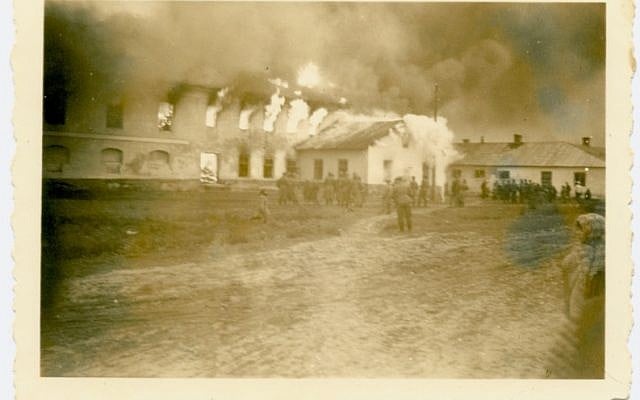 The burning of the Kock Synagogue in Poland. Although the torching of synagogues was common, photographs of the arson are rare. (photo credit: Shem Olam Institute)