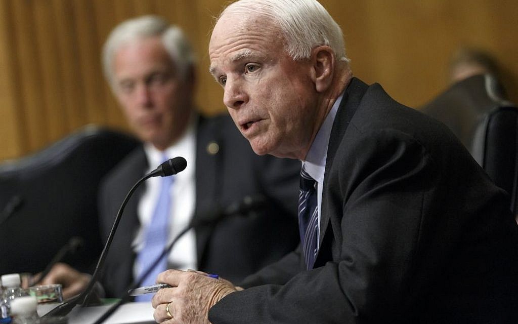Senate Foreign Relations Committee member Sen. John McCain, R-Ariz., heaps criticism on the Obama administration's policies with Russia, Iran and other international hot spots as he questions Secretary of State Kerry during the committee's hearing, on Capitol Hill in Washington, Tuesday, April 8, 2014. (photo credit: AP Photo/J. Scott Applewhite)