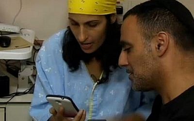 Miri Avrahami and her husband thank Lydia Labuschagne's brother Nick for agreeing to donate his sister's organs to Israeli patients in need. (photo credit: screen capture, Channel 2 News)