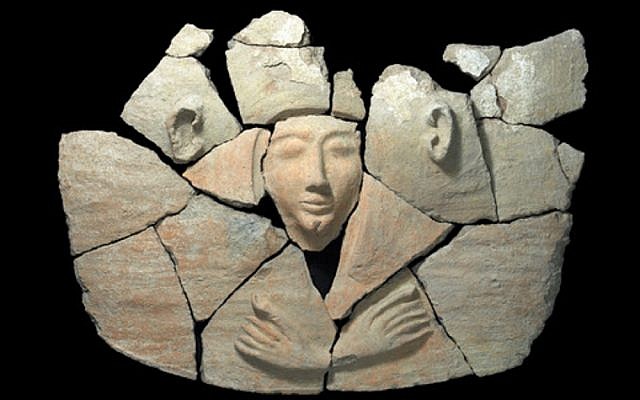 Parts of the anthropoid coffin’s lid after an initial cleaning. (photo credit: Clara Amit, courtesy of the Israel Antiquities Authority)