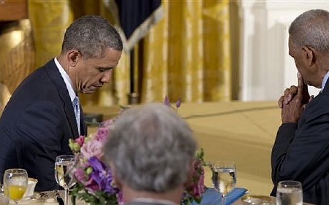 President Barack Obama closes his eyes as Dr. Joel C. Hunter, senior pastor of Northland, A Church Distributed, in Longwood, Fla., says the prayer during the Easter Prayer Breakfast, Monday, April 14, 2014, in the East Room of the White House in Washington. photo credit: AP Photo/Carolyn Kaster) President Barack Obama closes his eyes as Dr. Joel C. Hunter, senior pastor of Northland, A Church Distributed, in Longwood, Fla., says the prayer during the Easter Prayer Breakfast, Monday, April 14, 2014, in the East Room of the White House in Washington. photo credit: AP Photo/Carolyn Kaster)