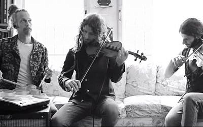 Percussionist Uriel Sverdin (L) and violinist Michael Greilsammer perform  their mashup of Israeli anthem 'Hatikva' and the Game of Thrones theme (screen capture: YouTube)