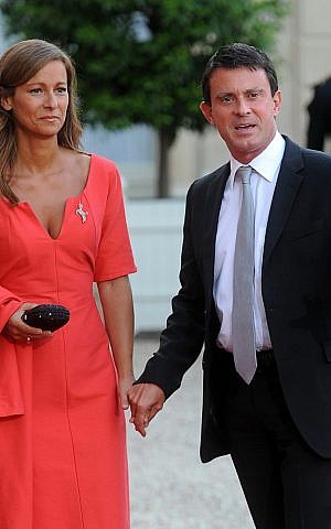 Manuel Valls, then the interior minister of France, arrives at a state dinner with his wife, Anne Gravoin, Sept. 3, 2013. (photo credit: Antoine Antoniol/Getty Images/JTA) Manuel Valls, then the interior minister of France, arrives at a state dinner with his wife, Anne Gravoin, Sept. 3, 2013. (photo credit: Antoine Antoniol/Getty Images/JTA)