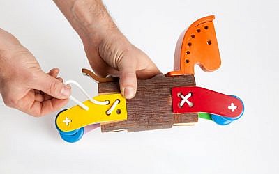 Making rocking horses and other toys out of recyclable goods at the Tel Aviv port (Courtesy Shenkar public relations department)
