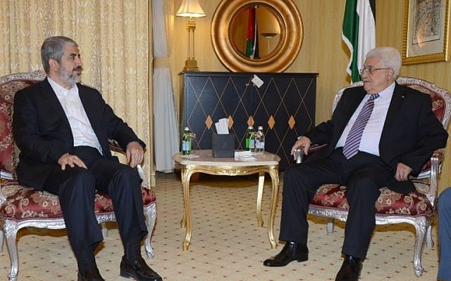 Palestinian leader Mahmoud Abbas, right, meeting with political bureau head of Hamas, Khaled Meshaal on May 5, 2014 in Doha, Qatar. (photo credit: AFP/ PPO/THAER GHANAIM) Palestinian leader Mahmoud Abbas, right, meeting with political bureau head of Hamas, Khaled Meshaal on May 5, 2014 in Doha, Qatar. (photo credit: AFP/ PPO/THAER GHANAIM)