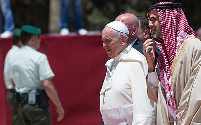 Pope Francis is welcomed in Amman by Jordan’s Prince Ghazi bin Mohammed (R), King Abdullah II's religious affairs adviser, on Saturday, May 24, 2014 upon his arrival. (photo credit: Osservatore Romano/AFP)