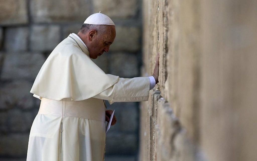 Pope Francis prays at the Western Wall, Judaism's holiest site, in Jerusalem's Old City on May 26, 2014. (photo credit: AFP/Thomas Coex)