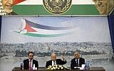 FIFA President Sepp Blatter sits between Prince Ali of Jordan (left), and Jibril Rajoub (right), who heads the Palestinian Football Federation, at the presidential headquarters in the West Bank city of Ramallah, on May 26, 2014. (photo credit: AFP/Abbas Momani)