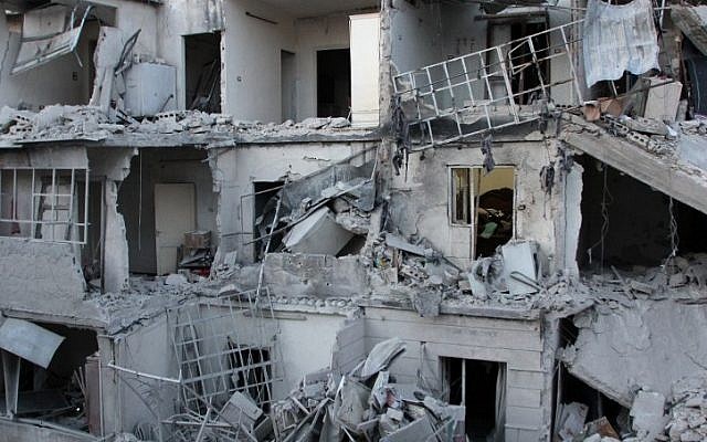 Destroyed buildings are seen following air raids in the northern Syrian city of Aleppo. (Photo credit: AFP/BARAA AL-HALABI) Destroyed buildings are seen following air raids in the northern Syrian city of Aleppo. (Photo credit: AFP/BARAA AL-HALABI)