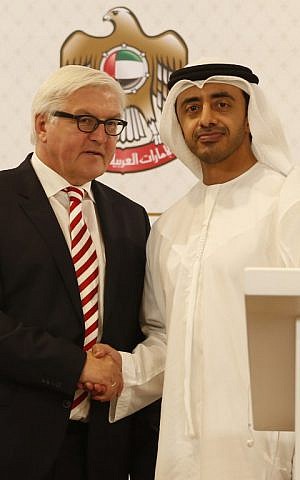 Foreign Minister of the United Arab Emirates (UAE) Abdullah bin Zayed Al-Nahyan (R) shakes hands with his German counterpart Frank-Walter Steinmeier during a press conference on May 31, 2014 in Abu Dhabi. (photo credit: AFP/Karim Sahib)