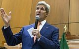 US Secretary of State John Kerry (R) stands alongside US Ambassador to Ethiopia Patricia Haslach as he speaks to US Embassy employees and their families at the US Embassy in Addis Ababa, Ethiopia, on May 1, 2014. (photo credit: AFP PHOTO / POOL / Saul LOEB)
