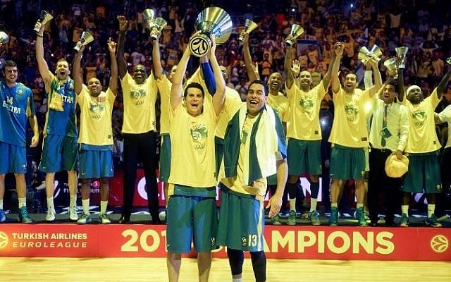Maccabi Tel Aviv players celebrate their victory at the end of their Euroleague 2014 3rd place Final Four basketball game against Real Madrid, on May 18, 2014, at the Mediolanum stadium in Assago, Italy. (photo credit: Olivier Morin/AFP) Maccabi Tel Aviv players celebrate their victory at the end of their Euroleague 2014 3rd place Final Four basketball game against Real Madrid, on May 18, 2014, at the Mediolanum stadium in Assago, Italy. (photo credit: Olivier Morin/AFP)