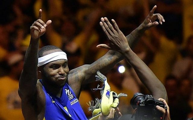 Maccabi Tel Aviv’s US guard Tyrese Rice , MVP of the Final Four (Winner of the Euroleague Final Four Most Valuable Player Award), celebrates his team's victory after their Euroleague 2014 Gold medal Final Four basketball game on May 18, 2014 at the Mediolanum stadium in Assago. (photo credit: Olivier Morin/AFP) Maccabi Tel Aviv’s US guard Tyrese Rice , MVP of the Final Four (Winner of the Euroleague Final Four Most Valuable Player Award), celebrates his team's victory after their Euroleague 2014 Gold medal Final Four basketball game on May 18, 2014 at the Mediolanum stadium in Assago. (photo credit: Olivier Morin/AFP)