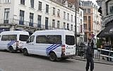 Policemen close access of the scene of a shooting near the Jewish Museum in Brussels, on May 24, 2014 (Photo credit: AFP/ Belga Photo/NICOLAS MAETERLINCK)