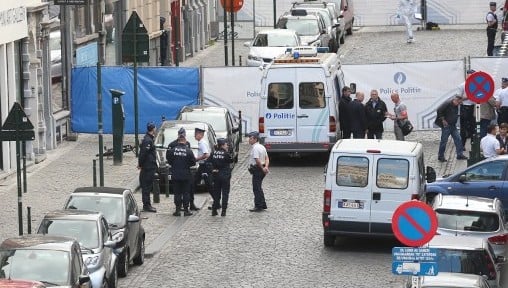 Policemen stand guard around the site of a shooting near the Jewish Museum in Brussels, on May 24, 2014. Three people were killed and one badly injured Saturday near the Jewish Museum in Brussels city centre. Photo credit: AFP/Belga/ Nicolas Maeterlinck) Policemen stand guard around the site of a shooting near the Jewish Museum in Brussels, on May 24, 2014. Three people were killed and one badly injured Saturday near the Jewish Museum in Brussels city centre. Photo credit: AFP/Belga/ Nicolas Maeterlinck)