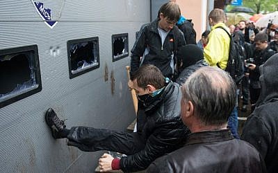 Pro-Russian militants storm a police station in the southern Ukrainian city of Odessa on May 4, 2014.  (photo credit: AFP/Dmitry Serebryakov)