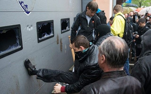 Pro-Russian militants storm a police station in the southern Ukrainian city of Odessa on May 4, 2014. (photo credit: AFP/Dmitry Serebryakov) Pro-Russian militants storm a police station in the southern Ukrainian city of Odessa on May 4, 2014. (photo credit: AFP/Dmitry Serebryakov)