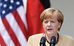 German Chancellor Angela Merkel speaks during a visit to the White House on May 2, 2014 (Photo credit: Jewel Samad/AFP)