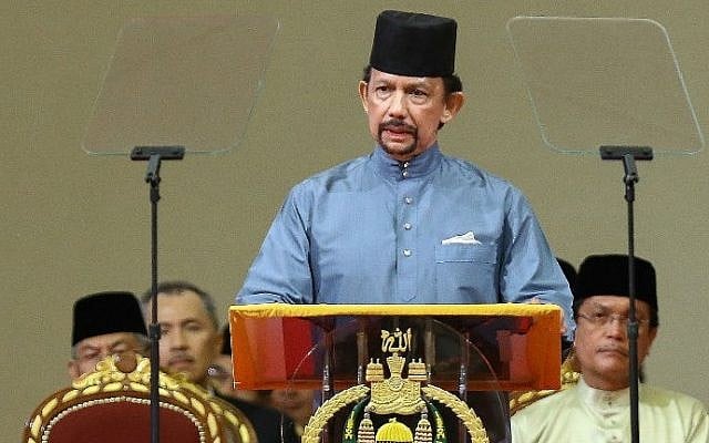 Brunei's Sultan Hassanal Bolkiah delivers a speech during the official ceremony of the implementation of Sharia Law in Bandar Seri Begawan on April 30, 2014. (photo credit: AFP) Brunei's Sultan Hassanal Bolkiah delivers a speech during the official ceremony of the implementation of Sharia Law in Bandar Seri Begawan on April 30, 2014. (photo credit: AFP)