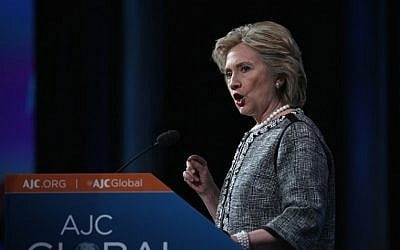 Former US secretary of state Hillary Clinton addresses the American Jewish Committee Global Forum on Wednesday, May 14, 2014 (photo credit: Alex Wong/Getty Images/AFP)