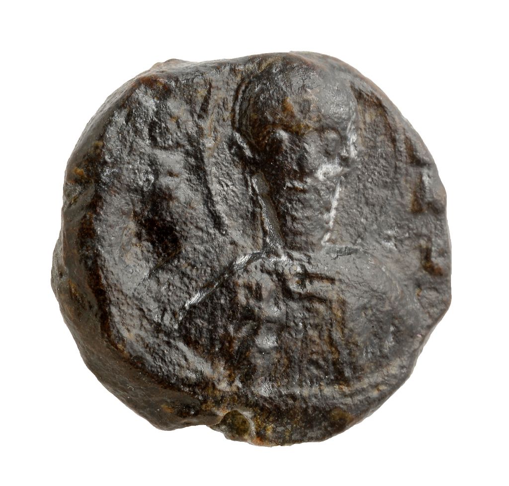 One side of the Crusader-era seal of St. Sabas monastery discovered in Jerusalem's Bayit Vegan neighborhood. (photo credit: Clara Amit/Israel Antiquities Authority)