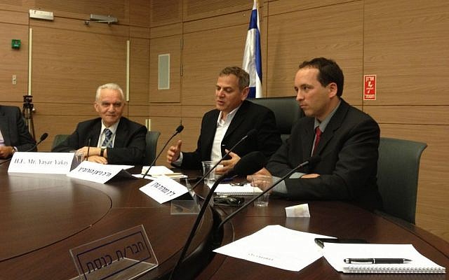 Yaşar Yakış (left) meets with members of the Knesset in Jerusalem, May 20, 2014 (photo credit: Elhanan Miller/TOI staff)