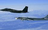 Illustrative photo of an American F-15 intercepting a Russian Tu-95 Bear Bomber during a Russian exercise near the west coast of Alaska in 2008. (US Air Force/Wikimedia Commons)