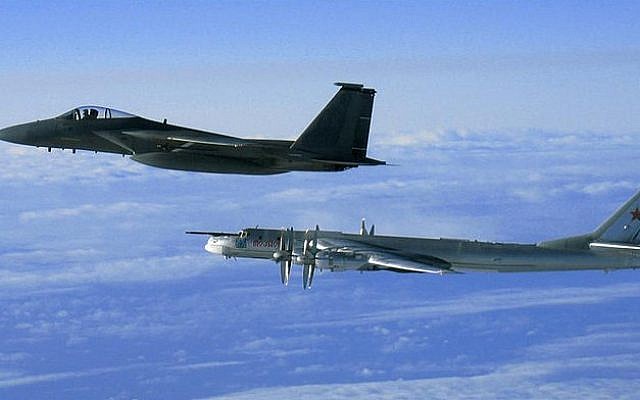 Illustrative photo of an American F-15 intercepting a Russian Tu-95 Bear Bomber during a Russian exercise near the west coast of Alaska in 2008. (US Air Force/Wikimedia Commons) Illustrative photo of an American F-15 intercepting a Russian Tu-95 Bear Bomber during a Russian exercise near the west coast of Alaska in 2008. (US Air Force/Wikimedia Commons)
