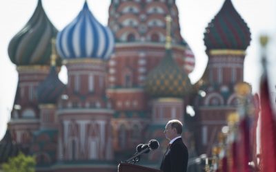 Vladimir Putin speaks during a Victory Day Parade in Red Square, with St. Basil Cathedral in the background, in Moscow, Russia, in May (photo credit: AP/Pavel Golovkin)