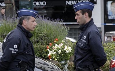 Belgian police at the site of a shooting at the Jewish Museum in Brussels, on Saturday, May 24, 2014. (AP Photo/Yves Logghe)