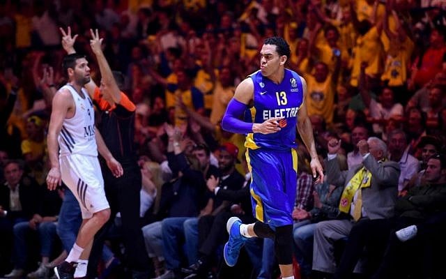 David Blu, right, shooting a three-pointer during a championship game for Maccabi Tel Aviv (photo credit: Noam Galai) David Blu, right, shooting a three-pointer during a championship game for Maccabi Tel Aviv (photo credit: Noam Galai)