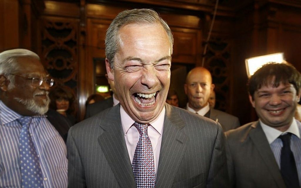 Nigel Farage, leader of Britain's UK Independence Party (UKIP), laughs as he arrives to hear results of the south east region European Parliamentary election vote at the Guildhall in Southampton, England, Sunday, May 25, 2014. (Photo credit: AP/Kirsty Wigglesworth) Nigel Farage, leader of Britain's UK Independence Party (UKIP), laughs as he arrives to hear results of the south east region European Parliamentary election vote at the Guildhall in Southampton, England, Sunday, May 25, 2014. (Photo credit: AP/Kirsty Wigglesworth)