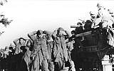 Illustrative photo of captive Nazi troops marching as American forces advance in Belgium, December 1944. (photo credit: US Signal Corps/public domain)