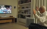 President Shimon Peres watches the Euroleague final which brought Maccabi Tel Aviv to victory, May 18, 2014.  (Photo credit: Courtesy)
