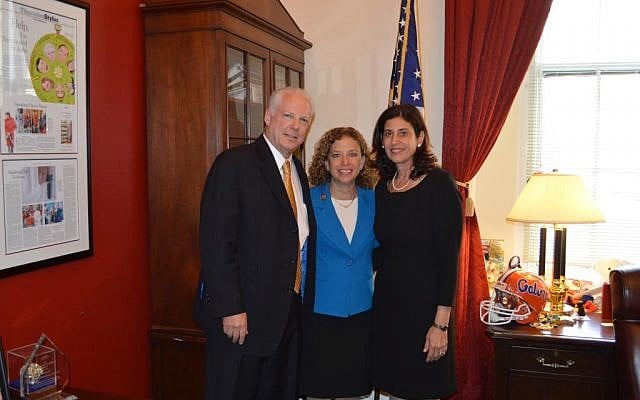 Yekutiel and Sheryl Wultz with Debbie Wasserman Schultz (center), Thursday, May 1, 2014. (photo credit: Courtesy) Yekutiel and Sheryl Wultz with Debbie Wasserman Schultz (center), Thursday, May 1, 2014. (photo credit: Courtesy)