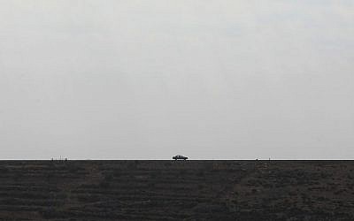 Illustrative photo of a car on a West Bank road, north of Jerusalem (Kobi Gideon/Flash90/File)