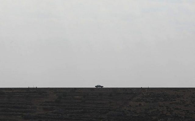 Illustrative photo of a car on a West Bank road, north of Jerusalem (Kobi Gideon/Flash90/File) Illustrative photo of a car on a West Bank road, north of Jerusalem (Kobi Gideon/Flash90/File)