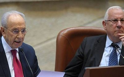 President Shimon Peres and his successor Reuven Rivlin in the Knesset in 2011 (Photo credit: GPO/Amos Ben Gershom/Flash90)